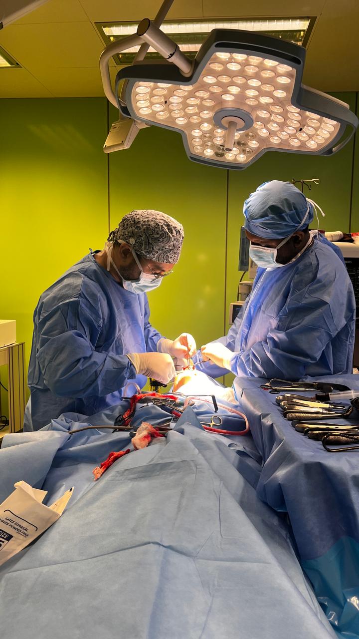 Dr. Khadar performing an oral and maxillofacial surgery