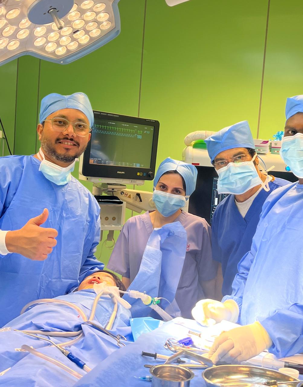 Dr. Khadar with surgical team in operating theatre